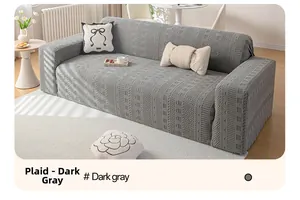 Detail of dark gray grid stretch sofa cover featuring high-density premium knit fabric texture