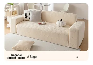 Detail of beige elastic sofa cover featuring premium anti-scratch 3D geometric texture