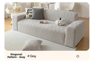 Detailed view of gray elastic sofa cover with diagonal lattice jacquard fabric and matching pillow