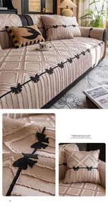Detail of coffee brown quilted sofa cushion with diamond patterns and black bow decor