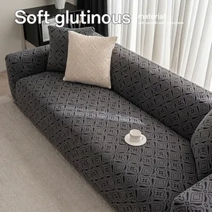 Deep grey elastic fleece sofa cover with geometric diamond pattern and matching pillowcase