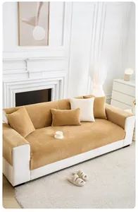 Close-up of thick milk velvet sofa cover with warm camel texture and stylish 3D jacquard