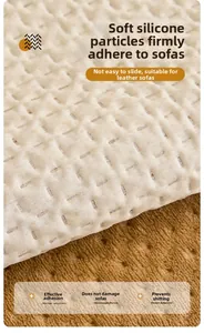 Detail of anti-slip soft silicone particles on quilted sofa cover for leather sofas