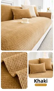 Detail of khaki milk fleece sofa cover with textured dot pattern and plush fabric