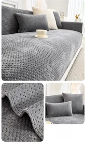 Close-up of thick dark grey milk velvet sofa cover with non-slip grain fabric texture