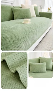 Close-up of green milk fleece sofa cover with 3D honeycomb texture and soft fabric