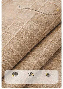 Close-up of thick chenille sofa cushion showing brown checkered weave texture and soft fabric