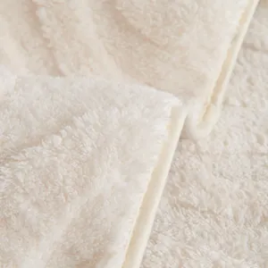 Thick cream velvet sofa cover featuring soft plush texture and anti-slip fixed fabric