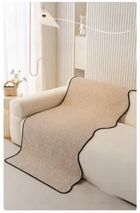 Detailed view of the thickened chenille sofa cover with woven texture and black edging