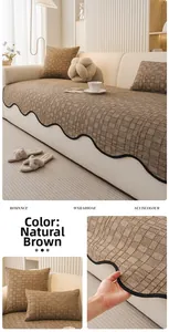 Macro detail of brown checkered chenille sofa cushion with black scalloped wavy edges