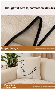 Detailed view of cream plush fabric with fine edge binding and minimalist face embroidery