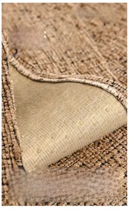 Macro detail of the high-weight chenille sofa cushion showing the non-slip silicone backing