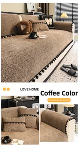 Close-up of coffee brown chenille sofa cover with decorative black pom-pom fringe details