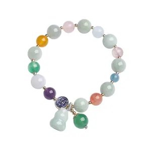 Multicolor jade gourd bead bracelet with gold metal spacers and enamel flower pendant