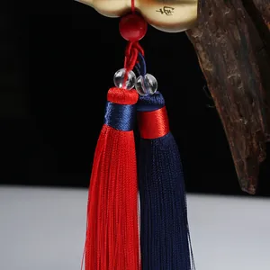 Traditional brass gourd car hanging ornament with red blue tassel and lucky charm