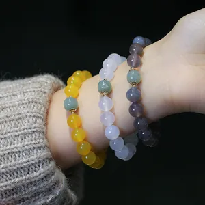 Bracciali di perline in agata naturale e giada in giallo viola e grigio con oro