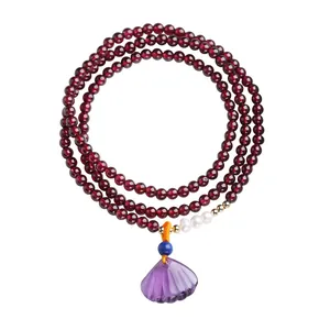 Garnet triple wrap bracelet with amethyst shell pendant and natural pearls