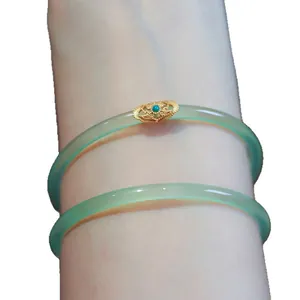 Apple green chalcedony Dingdang bangles featuring gold filigree turquoise Ruyi charm