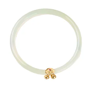 Apple green chalcedony jade bangle with golden ruyi charm and small jingling bells
