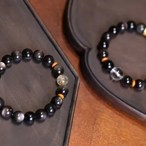Pulsera de obsidiana natural con cuarzo rutilado dorado y cuentas de cristal retro