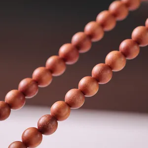 Sandalwood and Hetian jade double-loop bracelet with polished natural wood beads