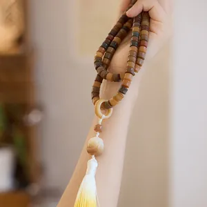 Ethnic weathered jade bodhi beads necklace with tassel and circular jade pendant