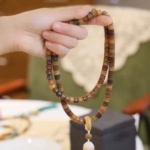 Handheld vintage multi-color weathered jade bodhi beads necklace with tassel pendant