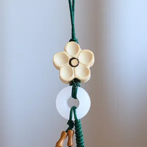 Exquisite lotus bodhi root car keychain with carved wooden flower and jade-like ring