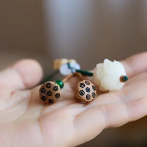 Exquisite handmade lotus flower and seed pod car keychain with green beads and lanyard