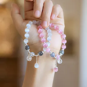 Minimalist cat eye stone bracelet with moonstone beads and silver pendants for women