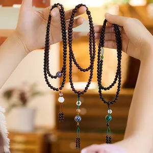 Authentic 108 sandalwood prayer beads with natural wood luster and elegant tassels