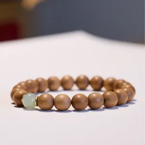 Bracciale in legno di sandalo Mysore 8mm con perla di giada Hetian e dettaglio dorato