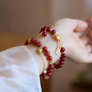 Bracelet en agate rouge naturelle pour femme avec breloques dorées et thème dragon