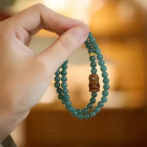 Bracelet double tour en jade bleu naturel avec perles vertes et charme de bouddha