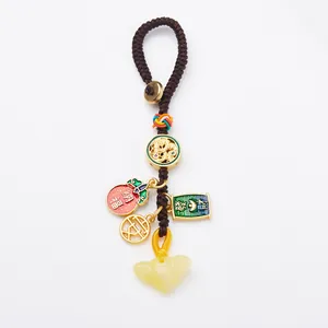 Llavero tradicional chino con colgante de ámbar y amuletos de la buena fortuna