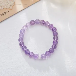 Natural amethyst beaded bracelet with sparkling zircon cylinder spacer charm