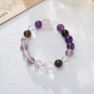 Handcrafted natural amethyst and multi-color crystal bead bracelet with silver accents