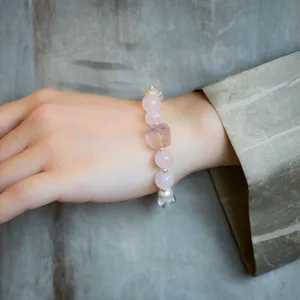 Natural rose quartz and fluorite lion bead bracelet with elegant silver fan charm