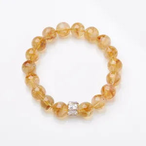 Brazilian citrine bead bracelet with square yellow gemstone in gold setting on white background