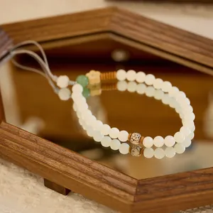 Natural white jade Bodhi root phone strap with green aventurine and wooden flower charm