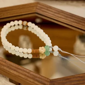 Natural white jade bodhi phone strap with green aventurine and wooden flower pendant