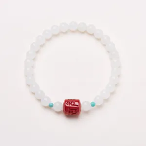 White jade beaded bracelet with red cinnabar charm and turquoise accents for women