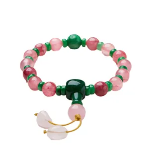 Bracciale di perle rosa e verdi con 18 semi, cristalli e nappe a forma di cuore