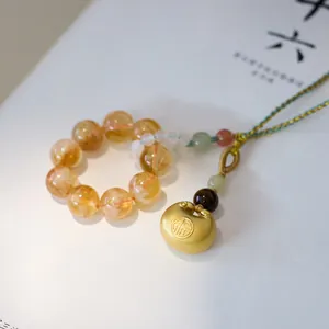 Natural yellow quartz crystal beads car charm with golden Fu lucky lock pendant