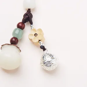 White jade bodhi seed keychain with money bag bell and wooden beads ornament