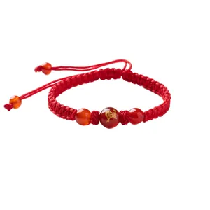 Adjustable red woven bracelet with natural red agate beads and golden zodiac horse design