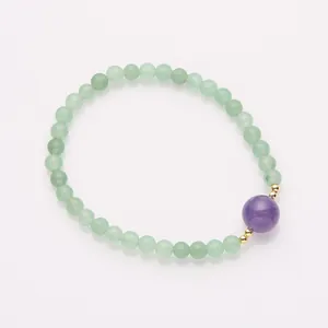 Natürliches 8mm Steinperlenarmband mit lila Amethyst und goldenen Distanzstücken