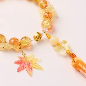 Exquisite Chinese style car hanging with yellow ice-cracked beads and maple leaf pendant