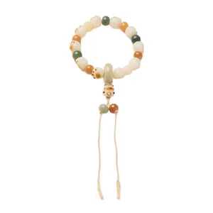 White Bodhi seed bracelet with cat charm and peace buckle on clean white background