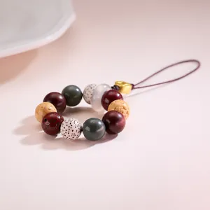 Handmade multi-gemstone Bodhi bead keychain with auspicious cloud metal detail